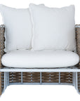 Stylish outdoor rattan one seat sofa with white cushions, perfect for creating a comfortable and modern alfresco space