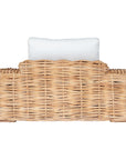 Natural wicker armchair with thick white cushions, showcasing a coastal-inspired design perfect for indoor and outdoor settings