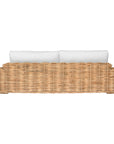 Natural wicker sofa with thick white cushion, showcasing a coastal-inspired design perfect for indoor and outdoor settings