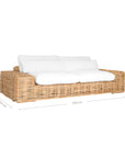 Natural wicker sofa with thick white cushion, showcasing a coastal-inspired design perfect for indoor and outdoor settings
