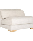 Modern white upholstered single sofa with soft, rounded cushions and light wooden legs