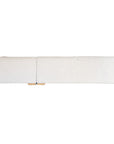 Modern white upholstered sofa with soft, rounded cushions and light wooden legs