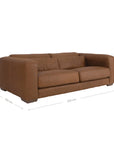 Modern leather upholstered sofa with soft, rounded cushions and light wooden legs