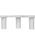 Zuburu coffee table in white concrete finish with organic curved tabletop and cylindrical pillar legs.