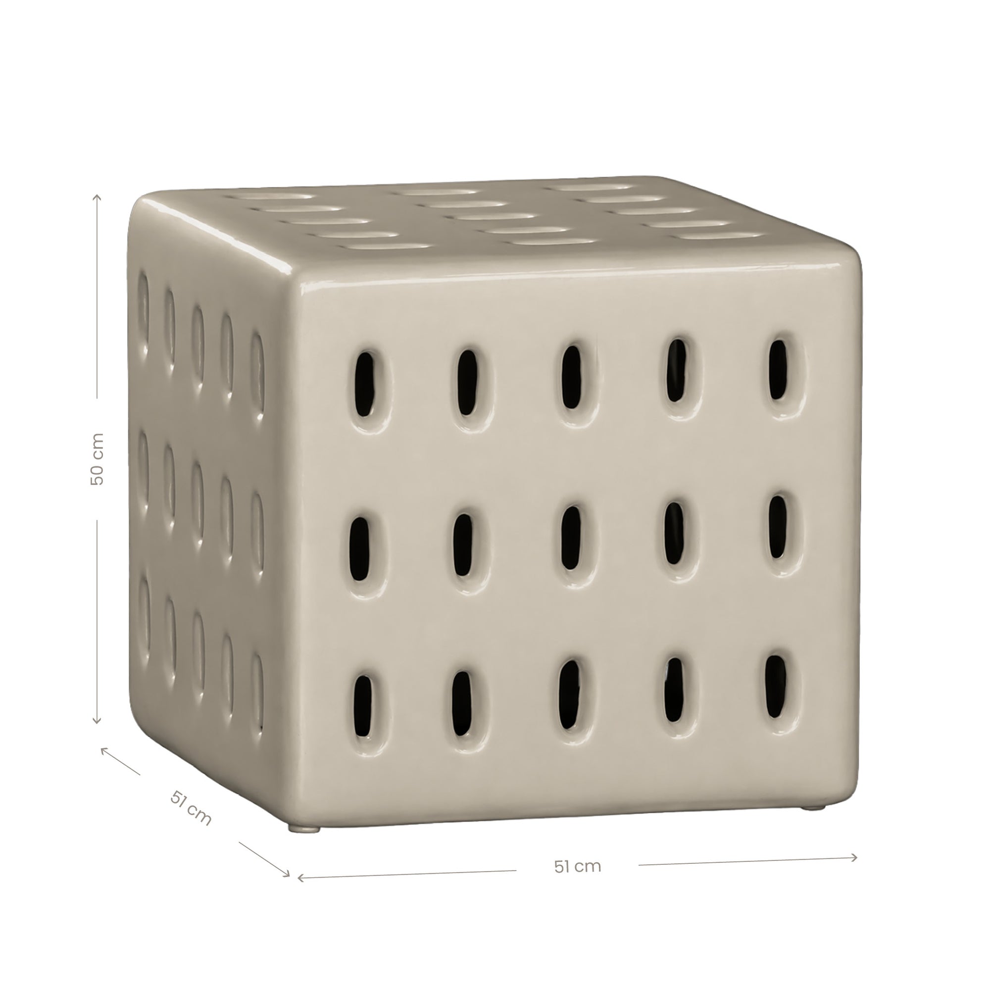 Niche side table in sand finish with perforated detailing creating a sculptural form with soft tonal warmth.