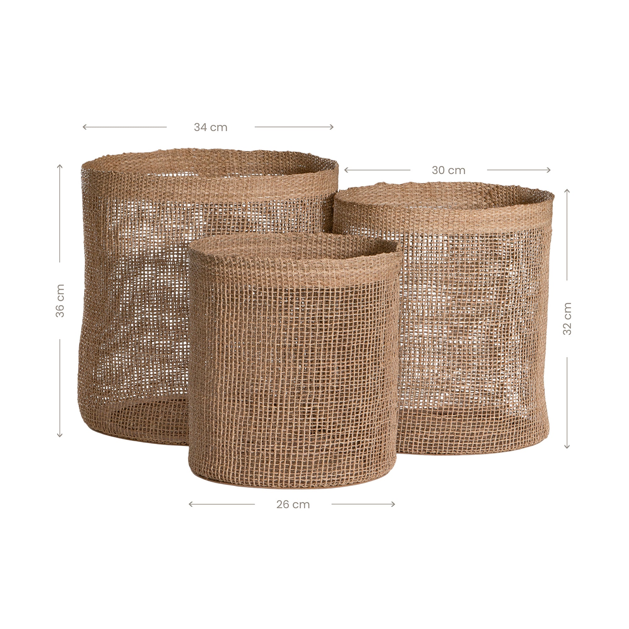 Set of three natural jute storage baskets with open weave design, perfect for stylish organisation and coastal decor.