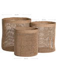 Set of three natural jute storage baskets with open weave design, perfect for stylish organisation and coastal decor.