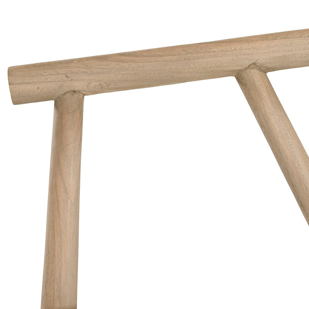 Lightwood spindle dining chair with a curved backrest and white upholstered seat, showcasing a modern yet timeless design. Crafted from solid wood, this chair brings a refined, natural aesthetic to any dining or living space