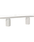 Ayanda bench in eggshell hydro dipped finish with elongated sculptural top and cylindrical pedestal legs.