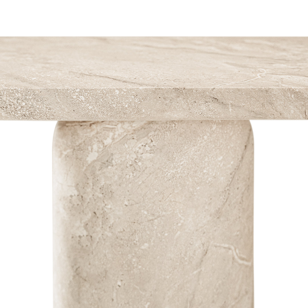Ayanda console in dune hydro dipped finish with elongated top and two cylindrical pedestal legs.
