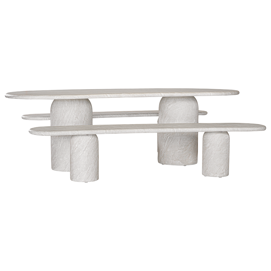 Ayanda dining table and bench seat in eggshell hydro dipped finish with oval tabletop and two cylindrical pedestal bases.