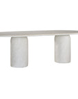 Ayanda dining table in eggshell hydro dipped finish with oval tabletop and two cylindrical pedestal bases.