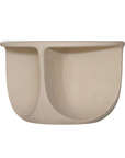 Berber coffee table in driftstone finish featuring sculptural curved legs and a softly rounded top with a textured natural surface.