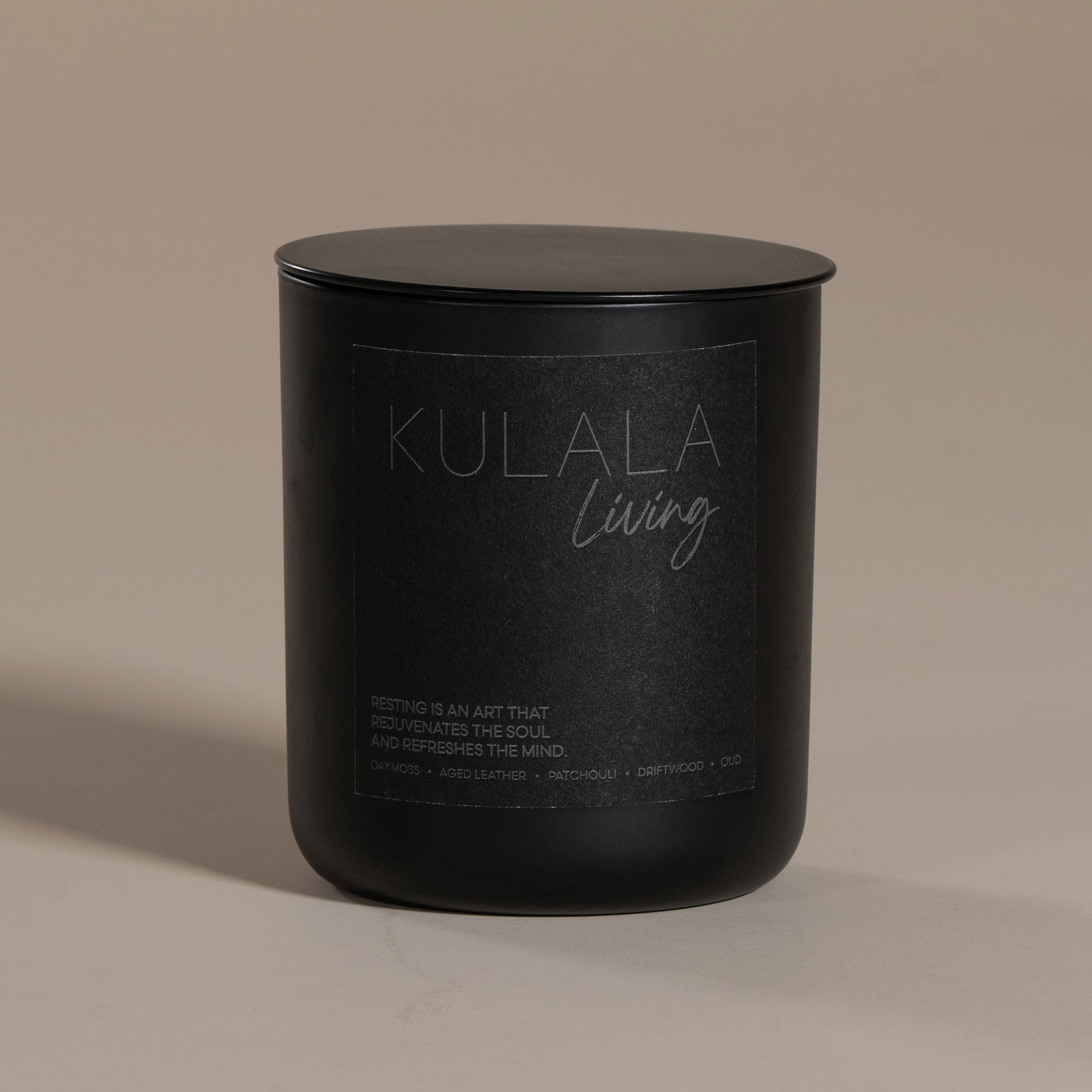 Kulala Living black candle set with minimalist branding, featuring two luxury soy wax candles in matte black vessels, set against a neutral background for a refined and elegant aesthetic