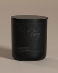 Kulala Living black candle set with minimalist branding, featuring two luxury soy wax candles in matte black vessels, set against a neutral background for a refined and elegant aesthetic