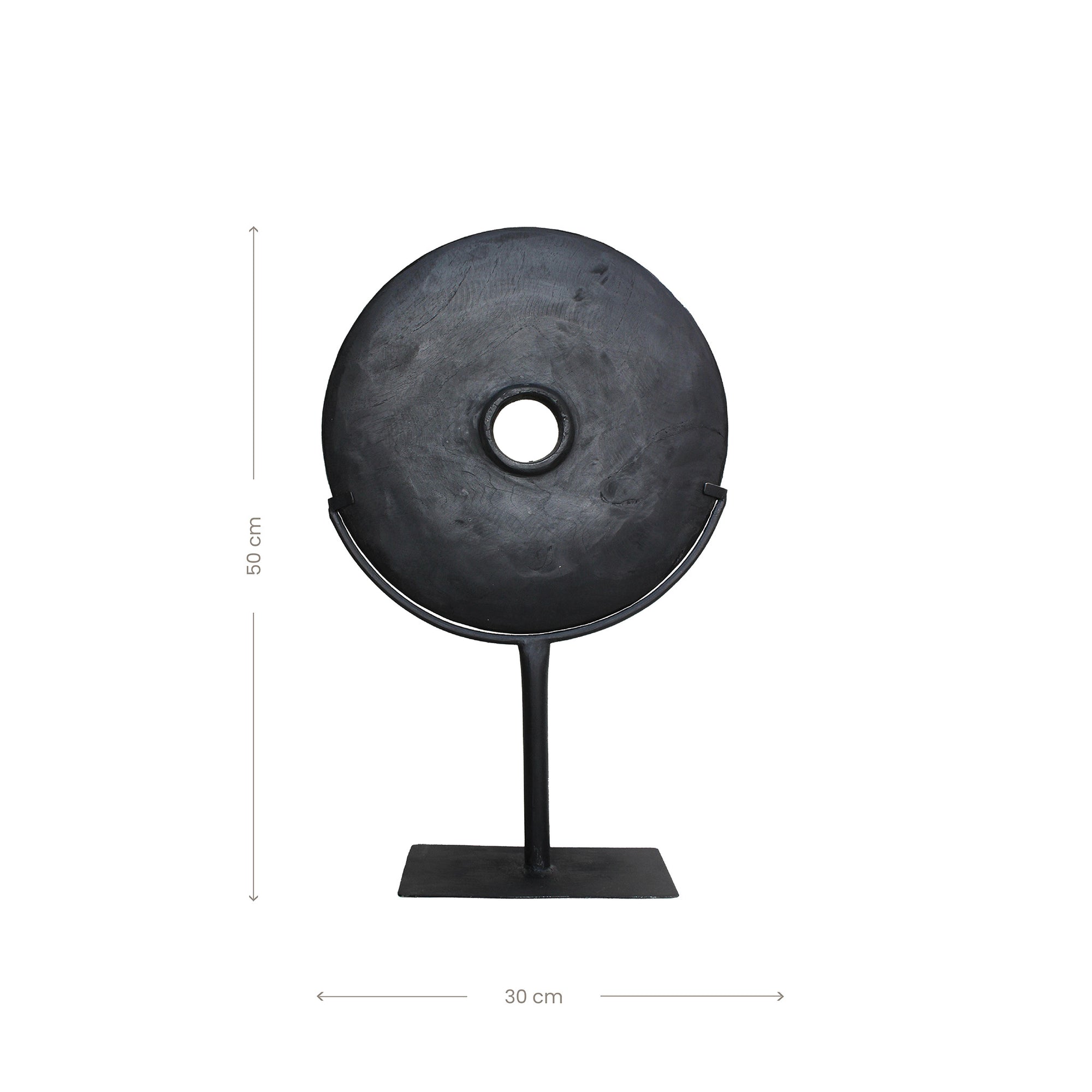 Black carved teak disc sculptures with stand in modern minimalist design, perfect for adding bold decorative accents to any interior space