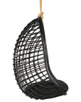 A stylish black hanging chair with an open-weave design, suspended by a natural rope and featuring a plush black cushion for ultimate relaxation