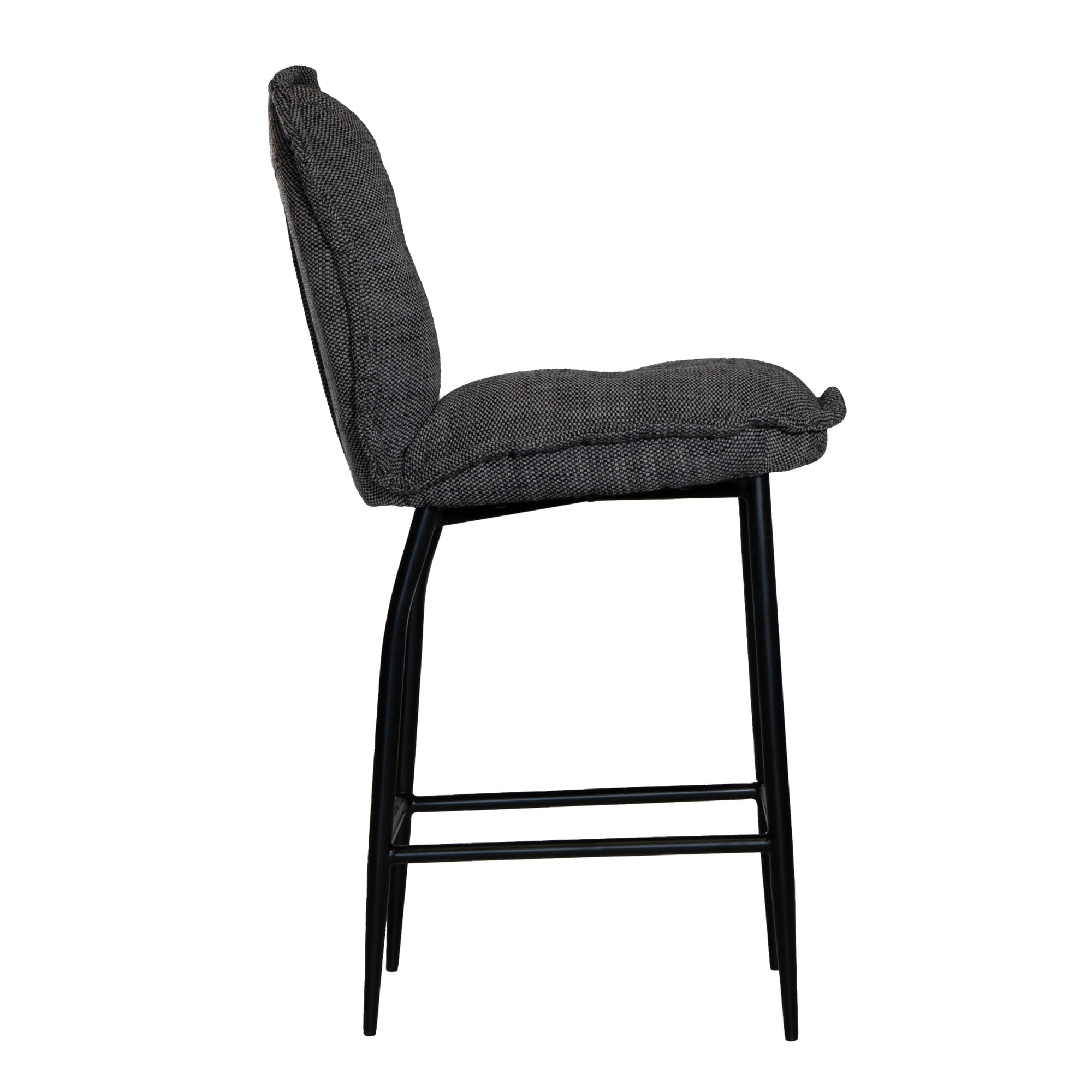 A black metal bar stool with a cushioned seat and backrest upholstered in dark linen fabric. Featuring a sleek yet relaxed design, this stool blends comfort with modern sophistication, ideal for contemporary kitchens or bar spaces