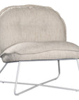 A modern natural lounge chair featuring a cushioned seat and backrest upholstered in textured linen fabric. Designed with a sleek metal frame, this chair offers a stylish and comfortable seating option for contemporary interiors