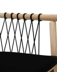 Modern black natural wooden dining chair with woven rope backrest and cushioned seat, perfect for contemporary lounge settings