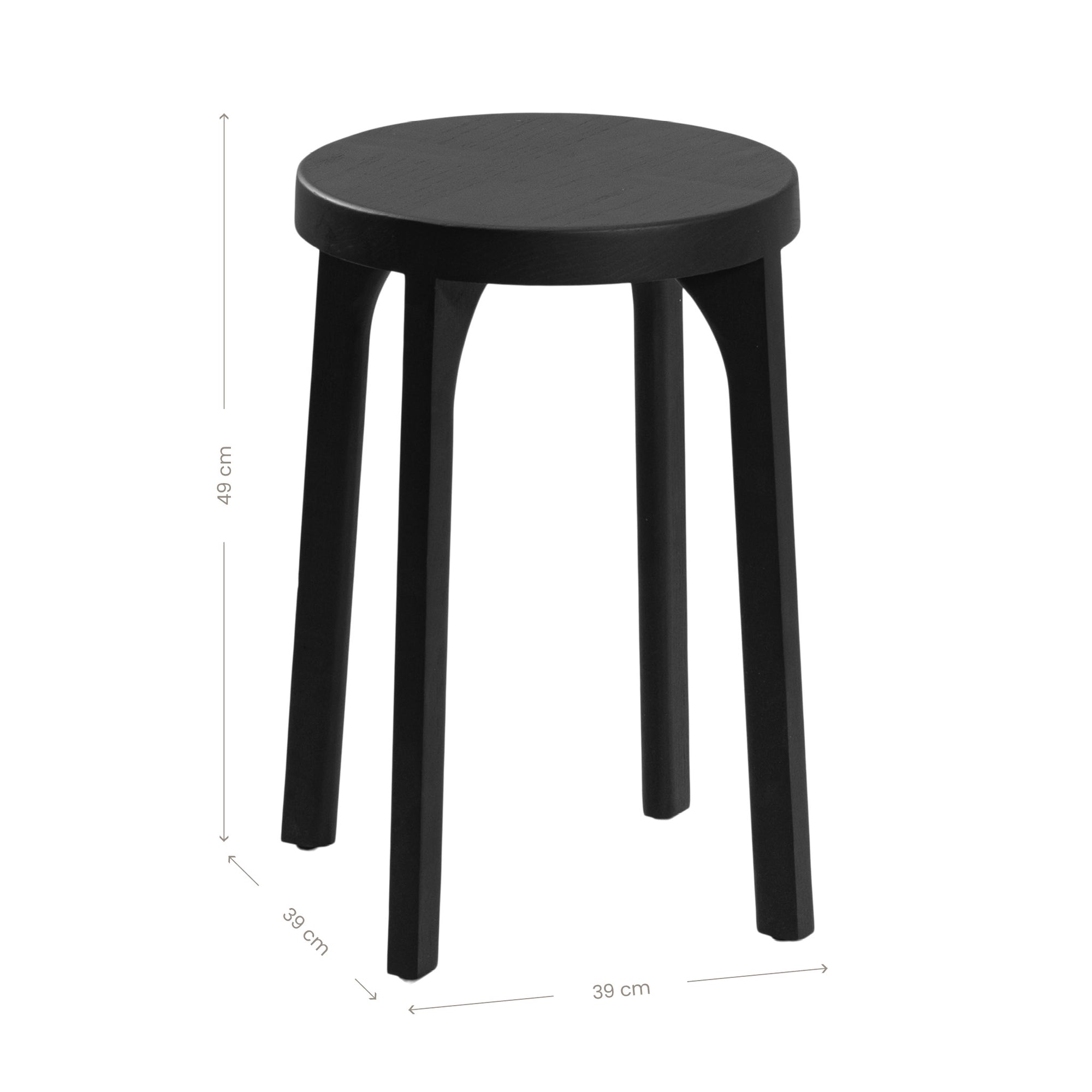 A sleek black oak round stool featuring a minimalist design with subtly curved legs. Crafted from solid oak with a matte black finish, this versatile piece functions as a stool or side table, adding a modern touch to any space