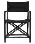Black wicker armchair with armrests and a sturdy cross-frame base, showcasing a contemporary design suitable for indoor or outdoor dining spaces.