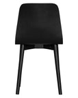 The Kulala Living black wood dining chair features a sleek, curved seat with a natural wood grain finish. Its minimalist design and sturdy legs make it a stylish and versatile addition to any modern dining space