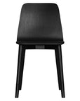 The Kulala Living black wood dining chair features a sleek, curved seat with a natural wood grain finish. Its minimalist design and sturdy legs make it a stylish and versatile addition to any modern dining space