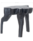 Handcrafted black wood root stool with an organic sculptural design, adding a bold and natural statement to any space