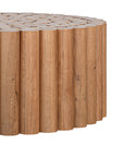 Caribbean Coffee Table in natural oak finish featuring a unique fluted cylindrical design, perfect for adding warmth and texture to contemporary living spaces.