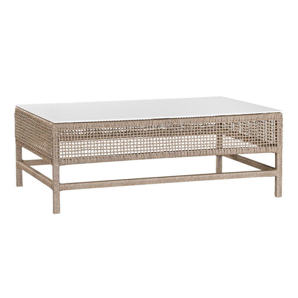 Coastal rattan coffee table with a natural woven frame and resin top, perfect for creating a relaxed, airy living space