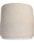 Coroo occasional chair in natural textured fabric with a soft curved backrest and rounded silhouette on a low plinth base.