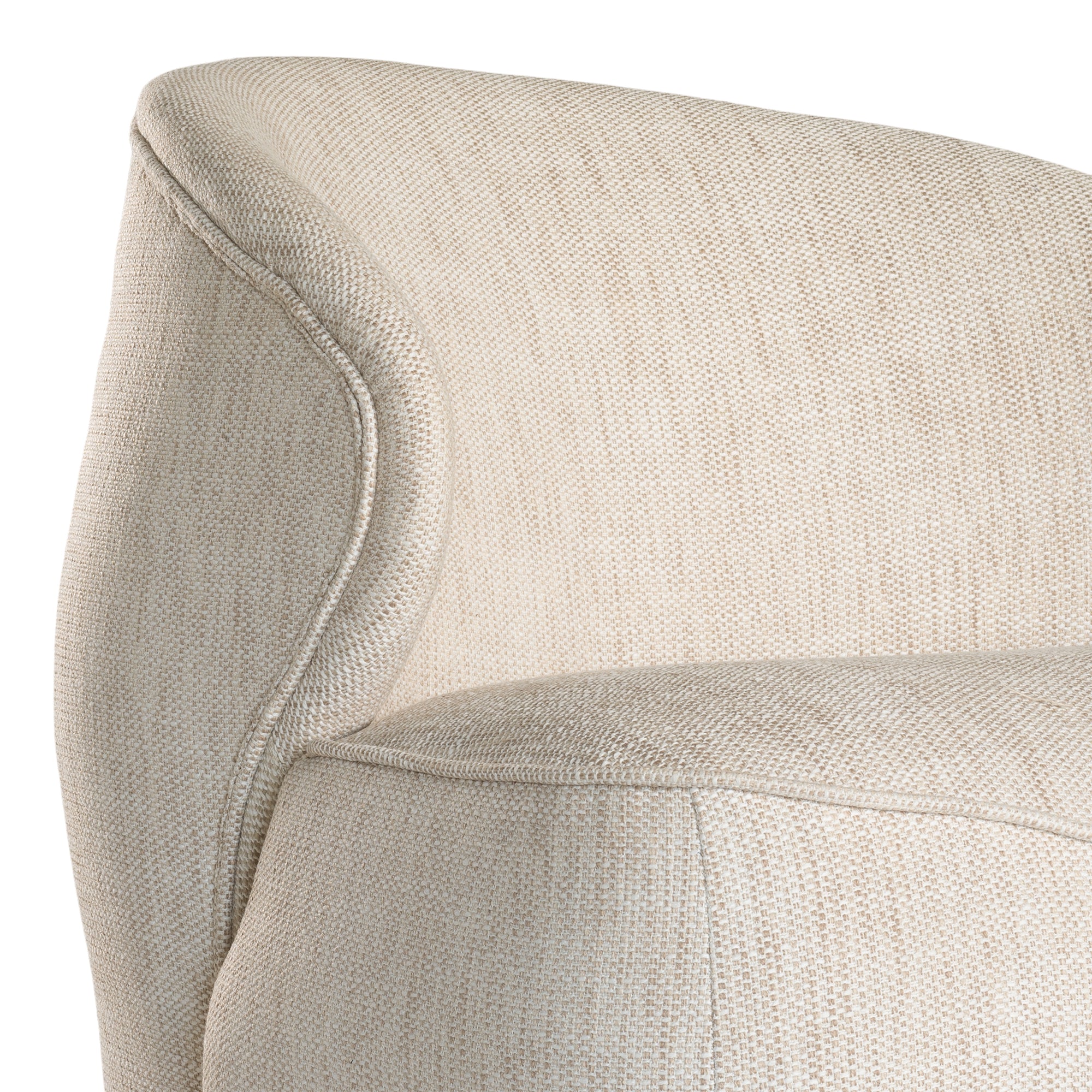 Coroo occasional chair in natural textured fabric with a soft curved backrest and rounded silhouette on a low plinth base.