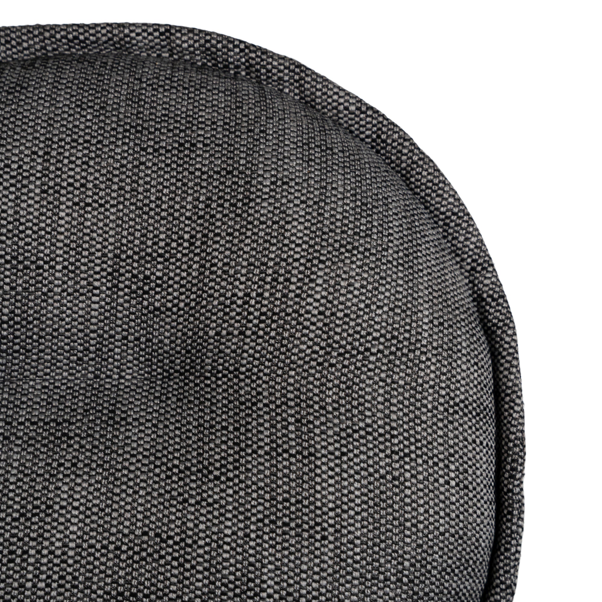 Contemporary dark grey upholstered dining chair with a plush, rounded backrest and cushioned seat, supported by sleek black metal legs for a sophisticated modern look