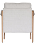 A sophisticated Hamptons-style armchair from KULALA Living, featuring a natural oak frame and soft linen upholstery in a neutral hue. Designed for both comfort and elegance, perfect for contemporary and coastal interiors