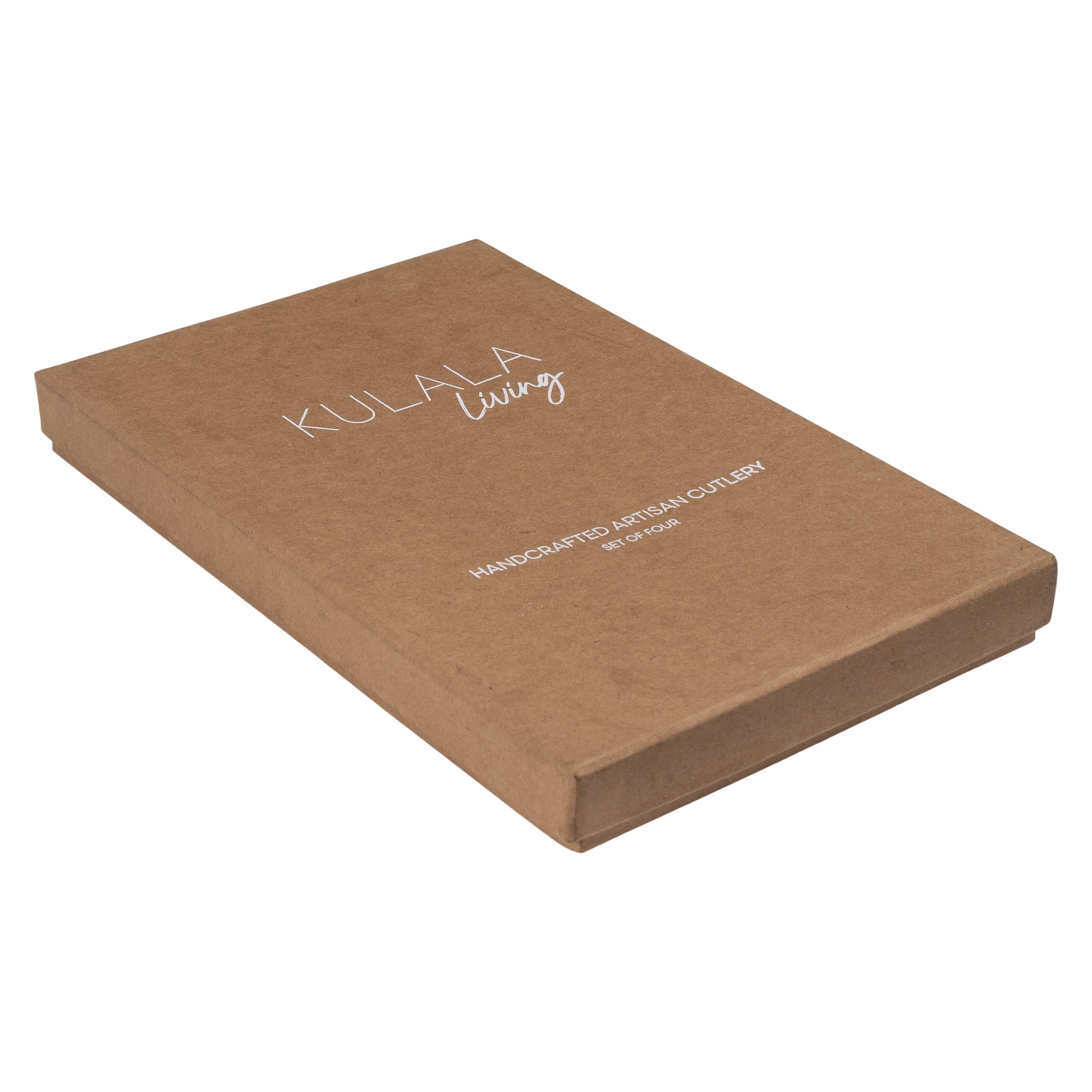 A set of four handcrafted stainless steel cutlery pieces with hand-forged handles, elegantly presented in a minimalist kraft gift box. Includes a dinner knife, fork, tablespoon, and teaspoon for a refined dining