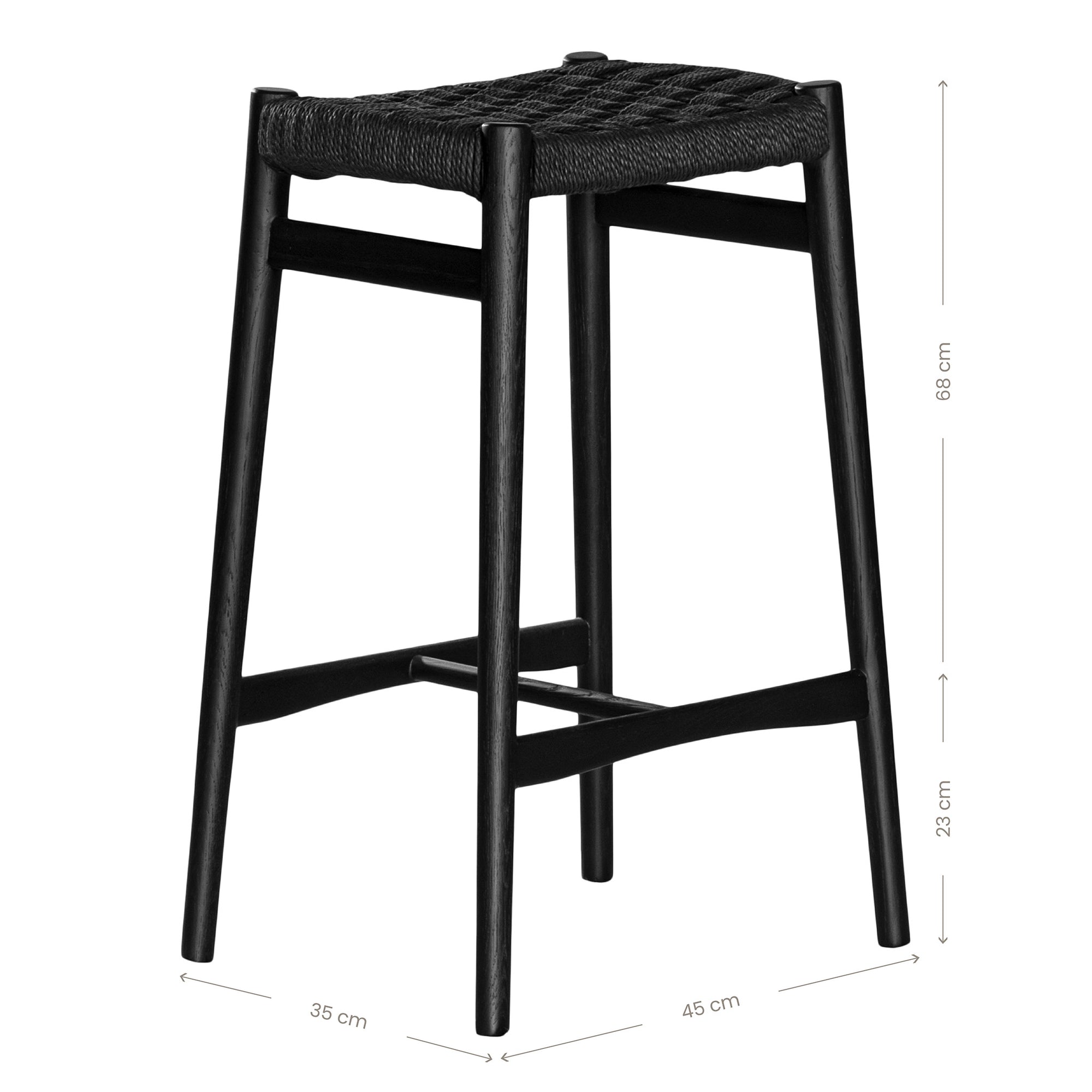 The Kulala Living Handwoven Counter Stool in black features a meticulously woven seat crafted from durable fibre, supported by a solid timber frame with a sleek black finish. This modern yet timeless piece adds texture and sophistication to kitchen and bar spaces.