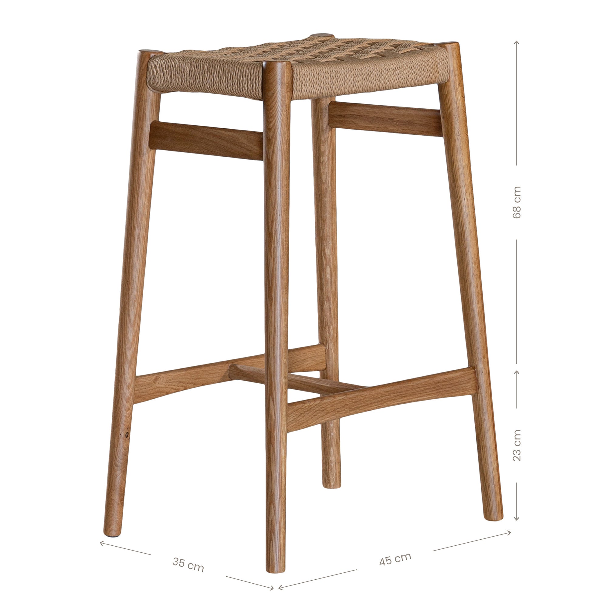 The Kulala Living Handwoven Counter Stool in natural features a meticulously woven seat crafted from durable fibre, supported by a solid timber frame with a sleek black finish. This modern yet timeless piece adds texture and sophistication to kitchen and bar spaces.