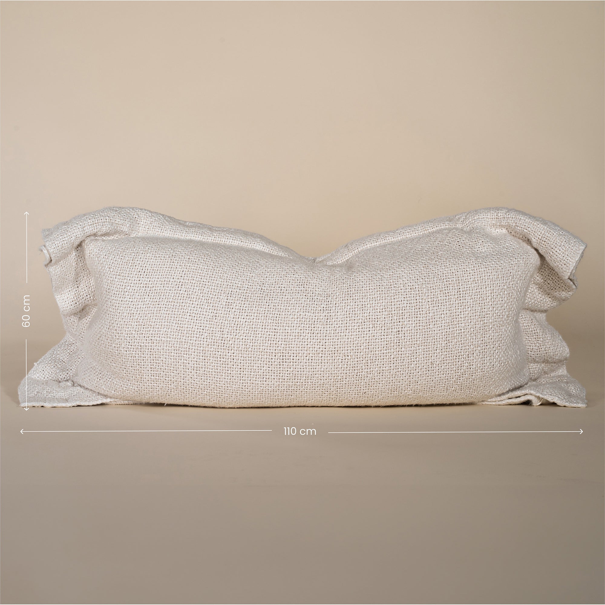 A soft, handwoven linen cushion cover in a natural off-white hue, featuring a relaxed, textured finish. Perfect for adding an organic touch to any living space