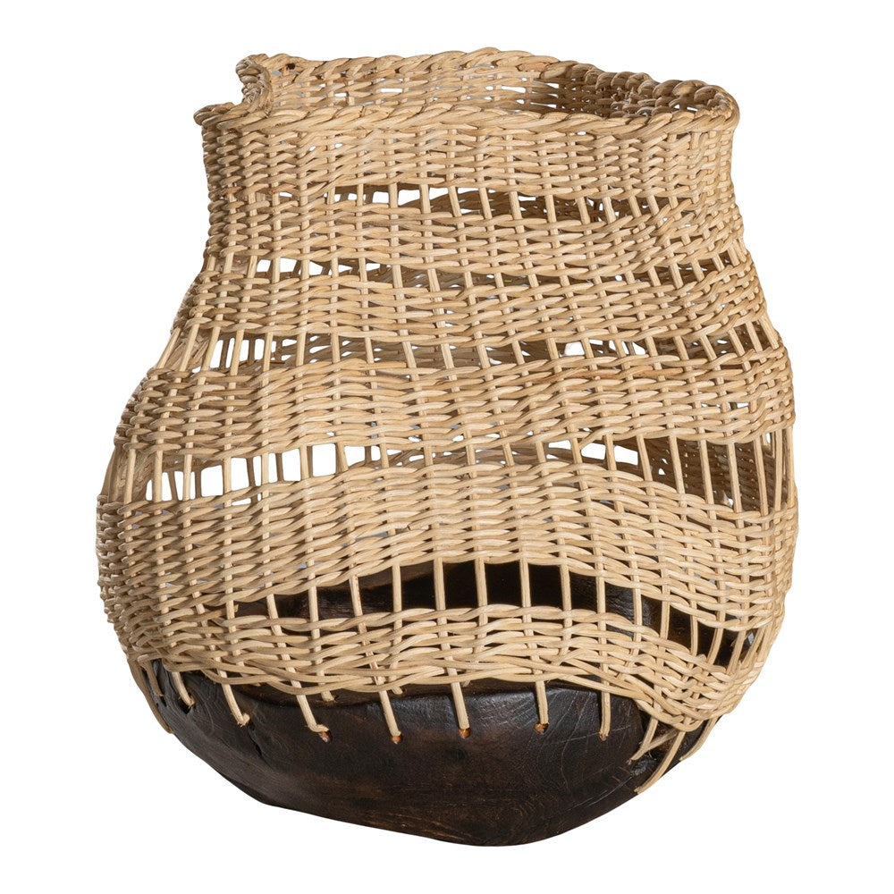 A unique handwoven rattan decorative basket with an open-weave design and a dark wooden base. A statement piece that adds texture and organic warmth to any interior