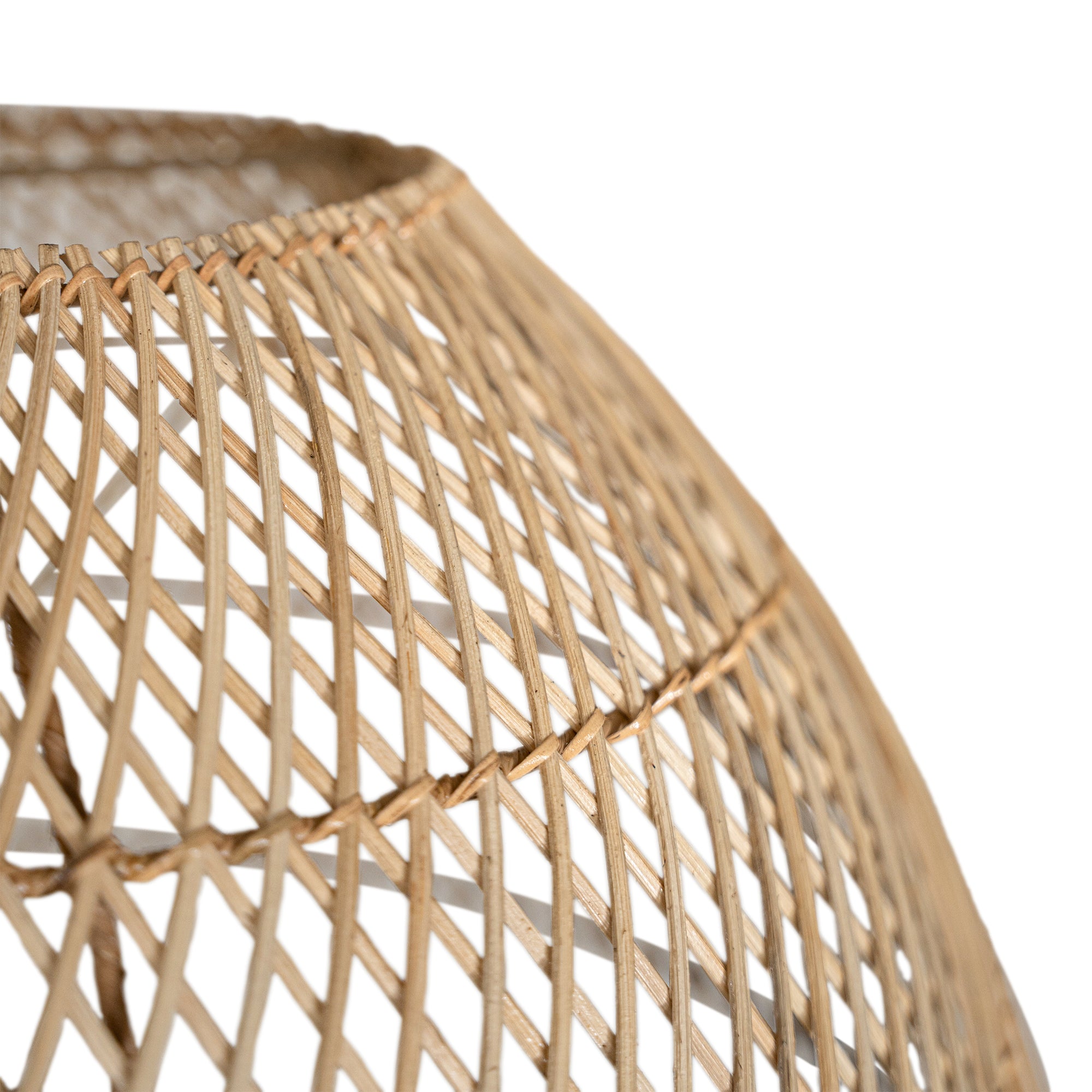 A handcrafted rattan pendant light in a natural finish, featuring an airy woven design that casts soft, ambient lighting. Perfect for coastal, bohemian, and contemporary interiors