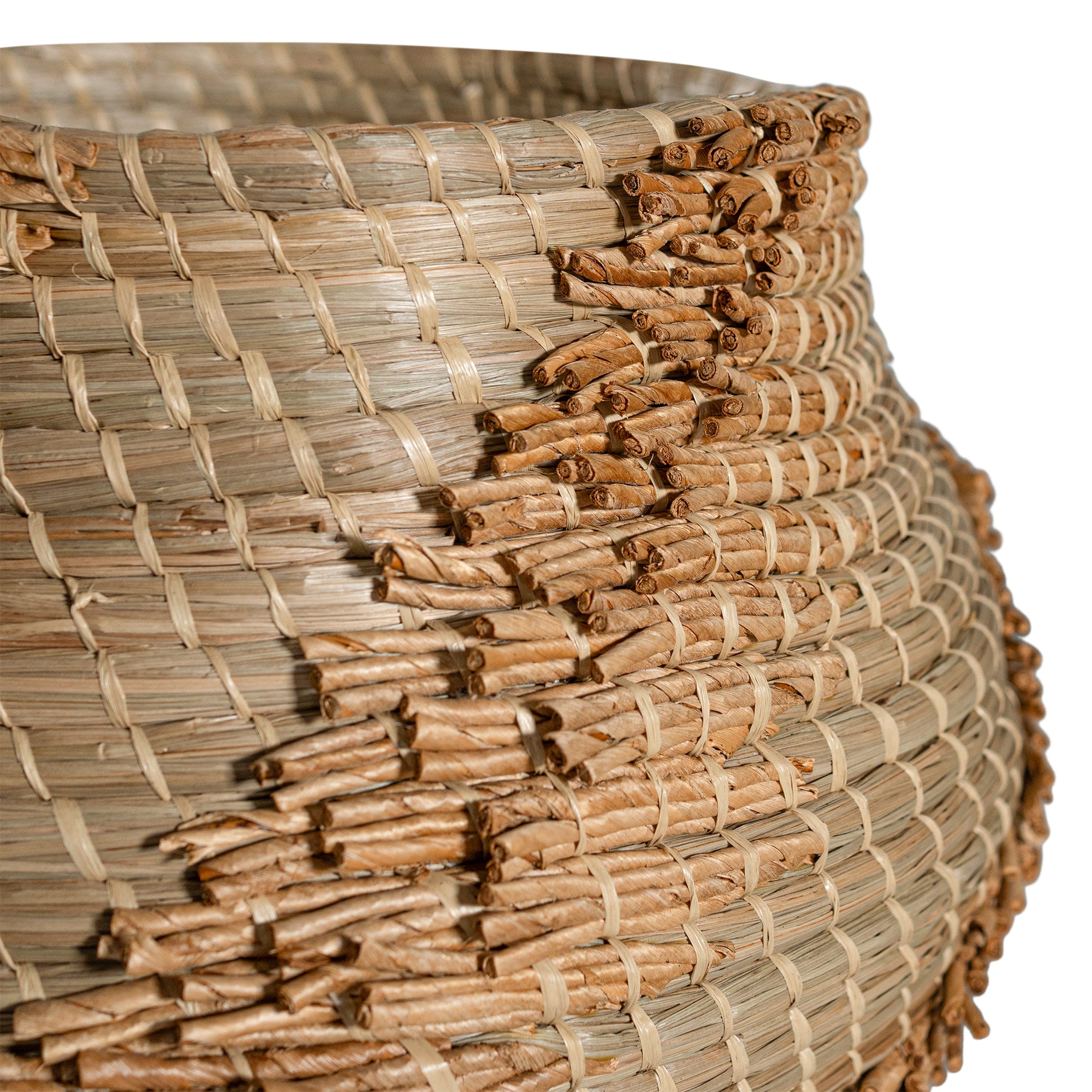 Handwoven seagrass basket with organic textured detailing, featuring natural tones and intricate weaving, ideal for contemporary home decor