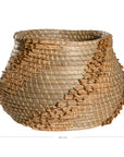 Handwoven seagrass basket with organic textured detailing, featuring natural tones and intricate weaving, ideal for contemporary home decor