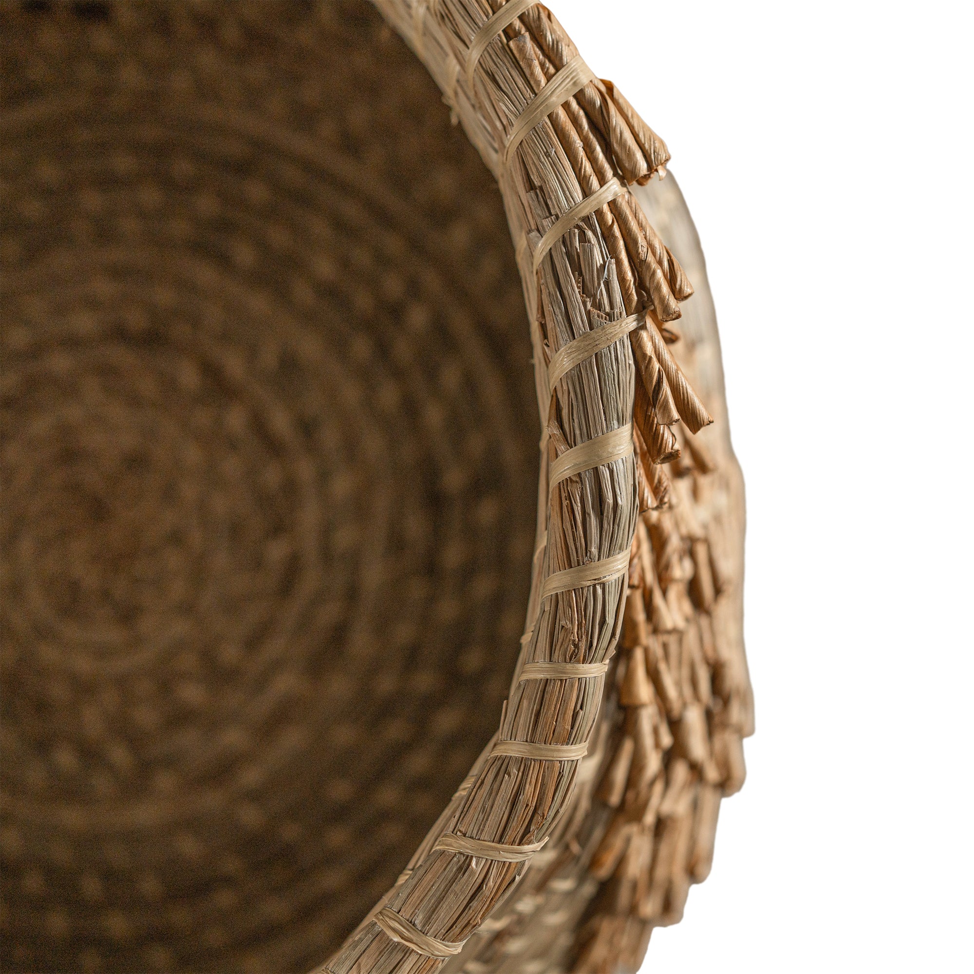 Handwoven seagrass basket with organic textured detailing, featuring natural tones and intricate weaving, ideal for contemporary home decor