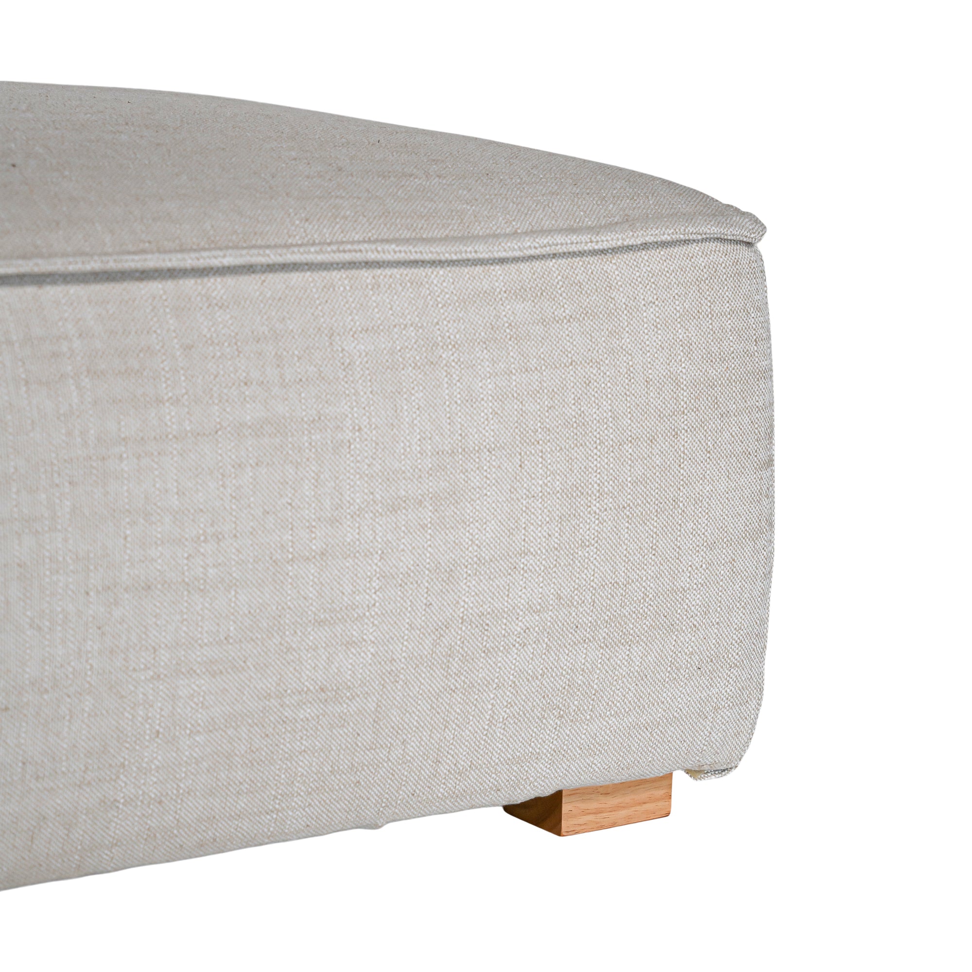 A versatile wheat modular ottoman with soft linen upholstery, designed for effortless comfort and modern living. Perfect as a standalone piece or paired with matching modular seating