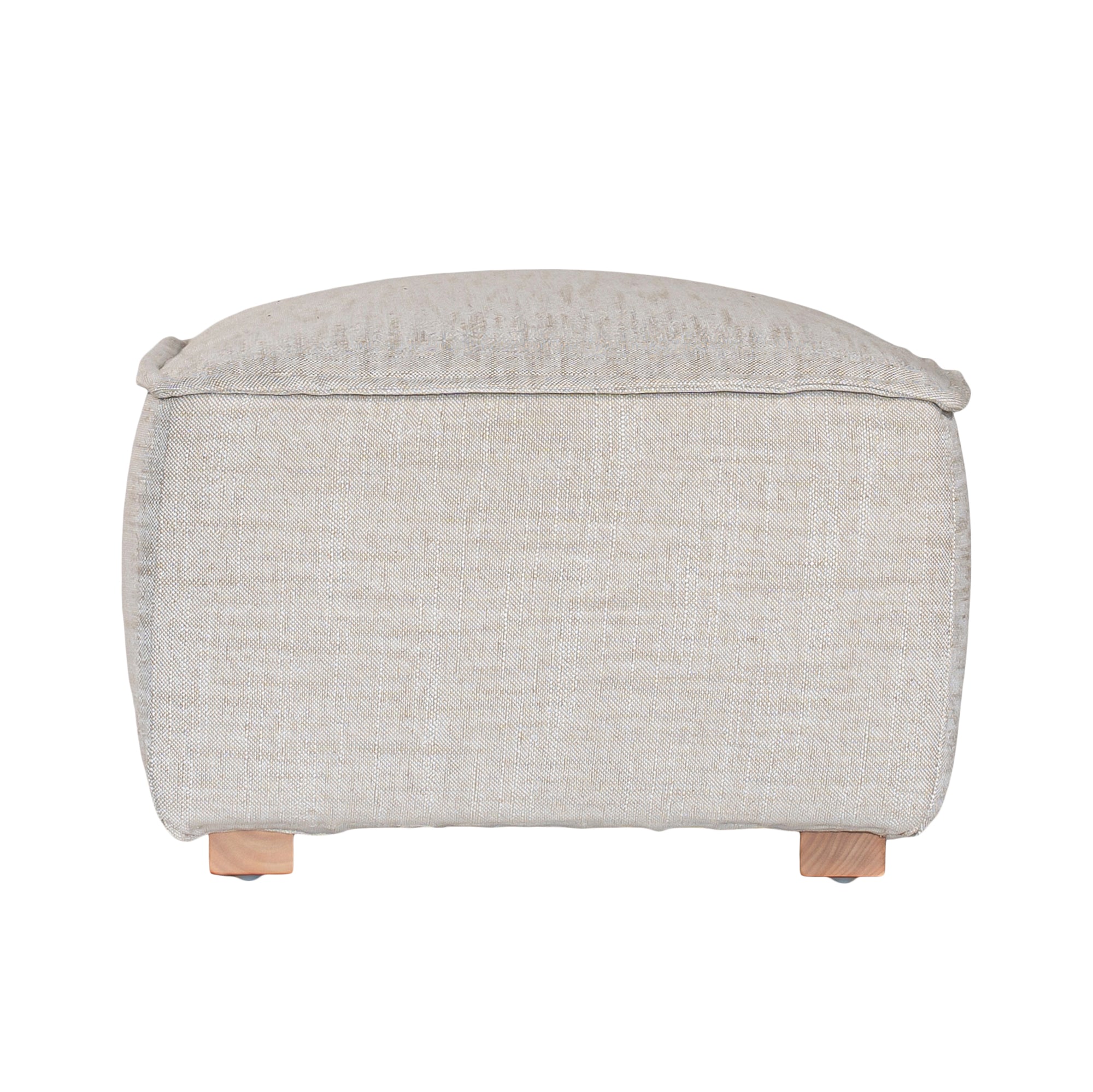 A versatile wheat modular ottoman with soft linen upholstery, designed for effortless comfort and modern living. Perfect as a standalone piece or paired with matching modular seating