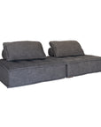 A stylish grey linen modular sofa with a low-profile design and plush cushioning, offering a relaxed and contemporary seating option for modern interiors