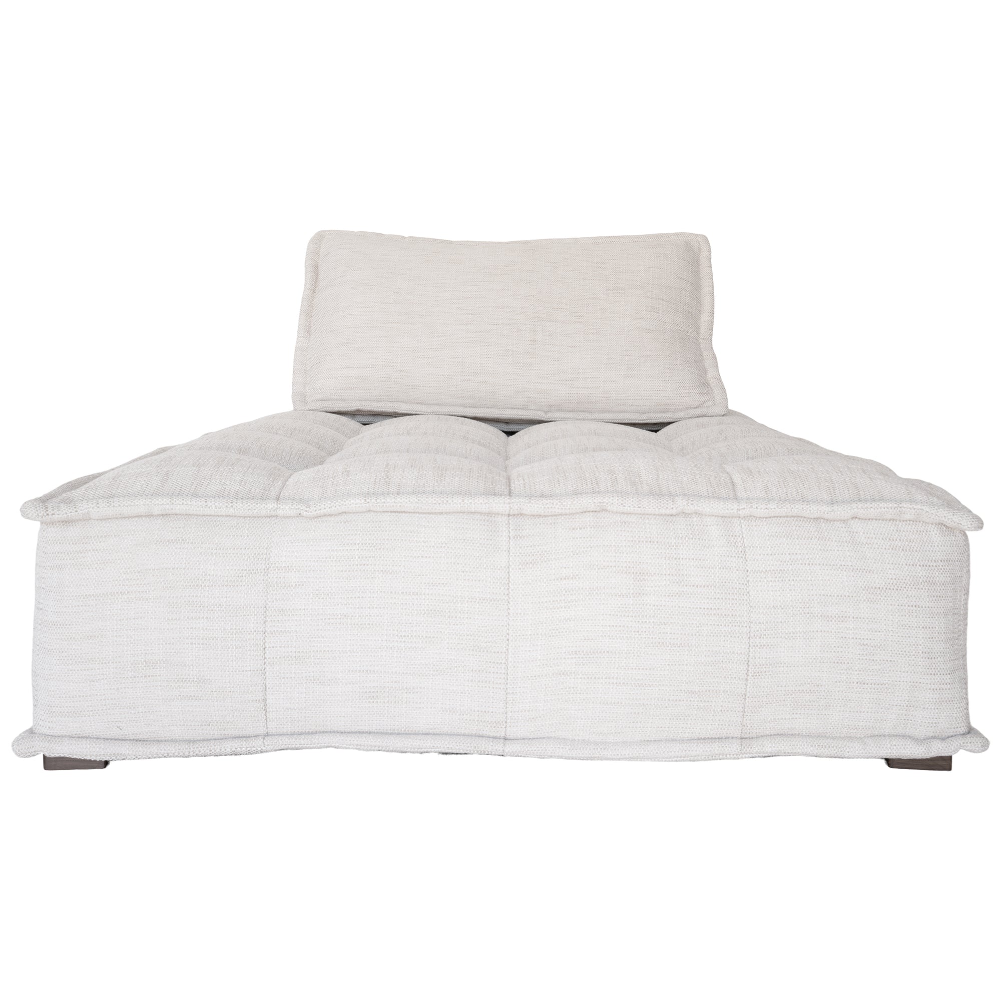 A stylish natural modular chaise with a low-profile design and plush cushioning, offering a relaxed and contemporary seating option for modern interiors
