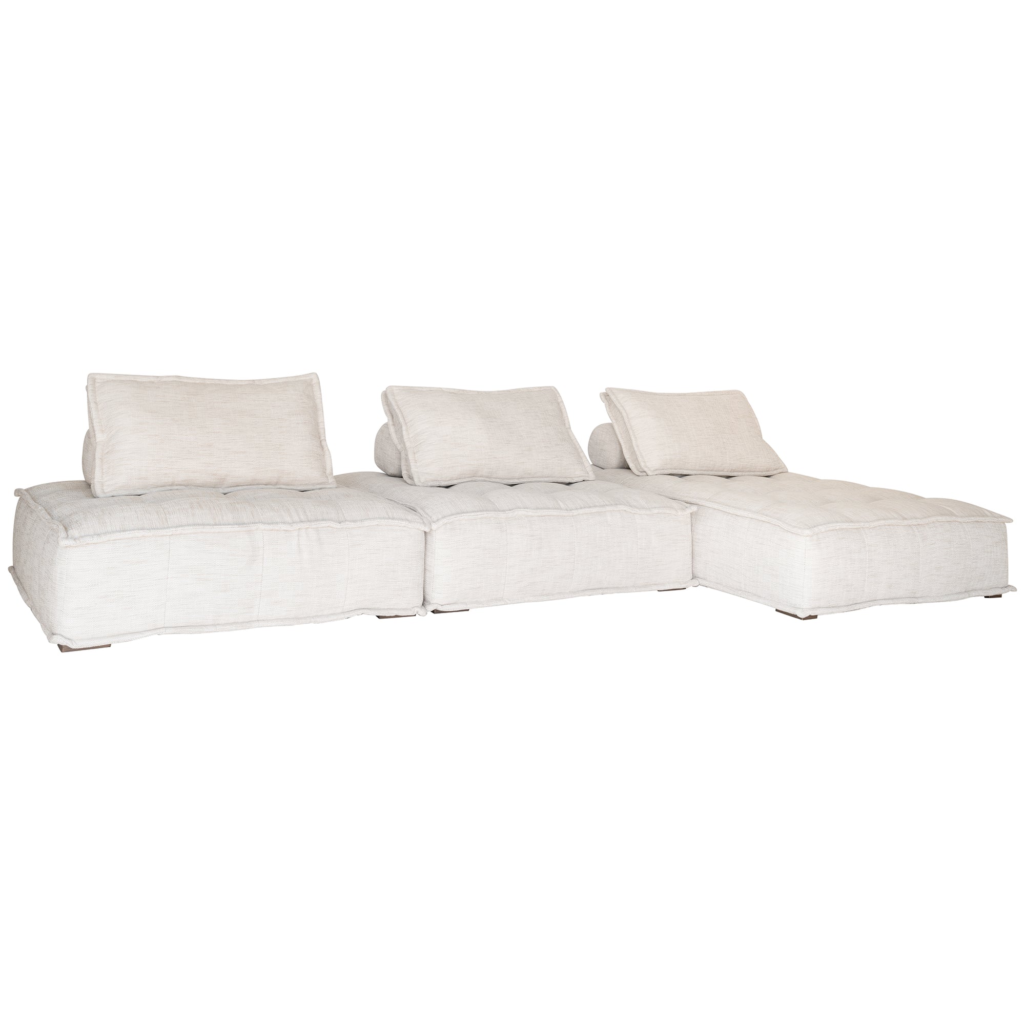 A stylish natural modular chaise with a low-profile design and plush cushioning, offering a relaxed and contemporary seating option for modern interiors
