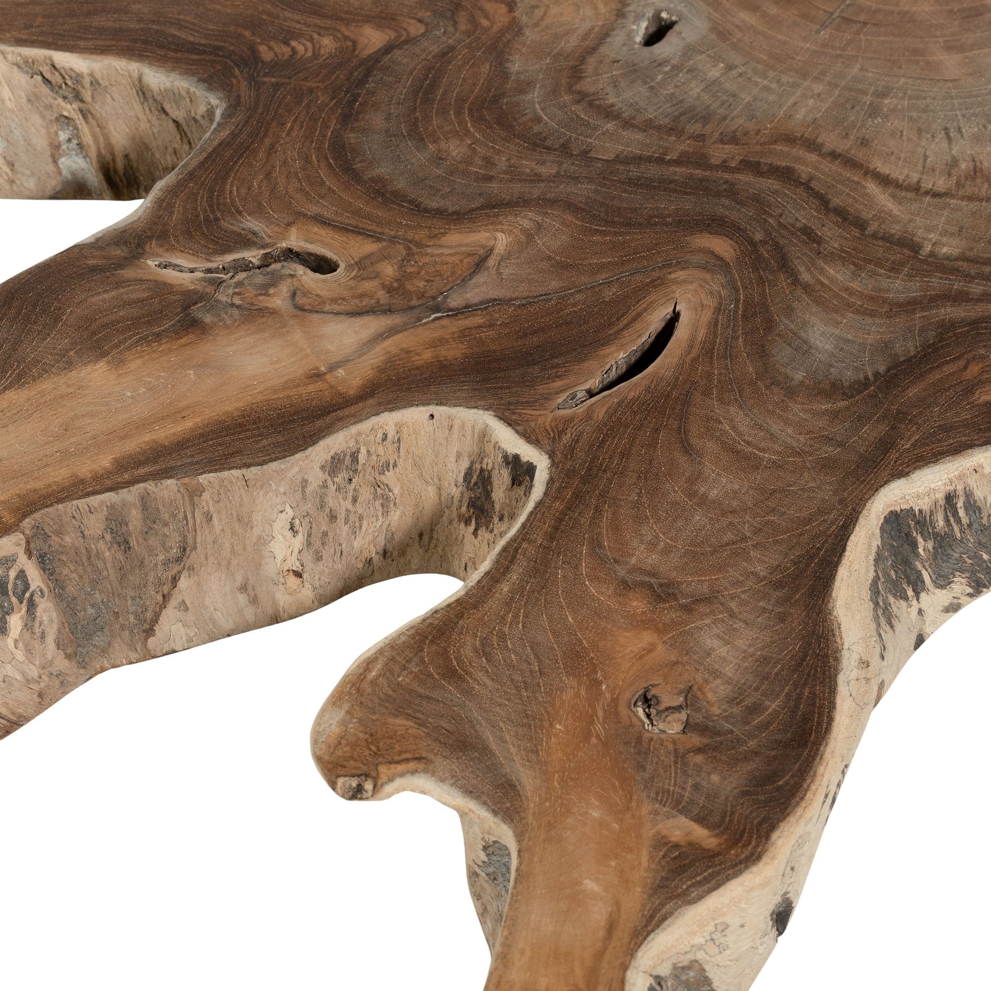 Koro serving board in teak featuring natural edge detail and rich organic wood grain.